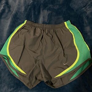 Nike work out shorts! Color is Lime green, yellow gray. It’s size small